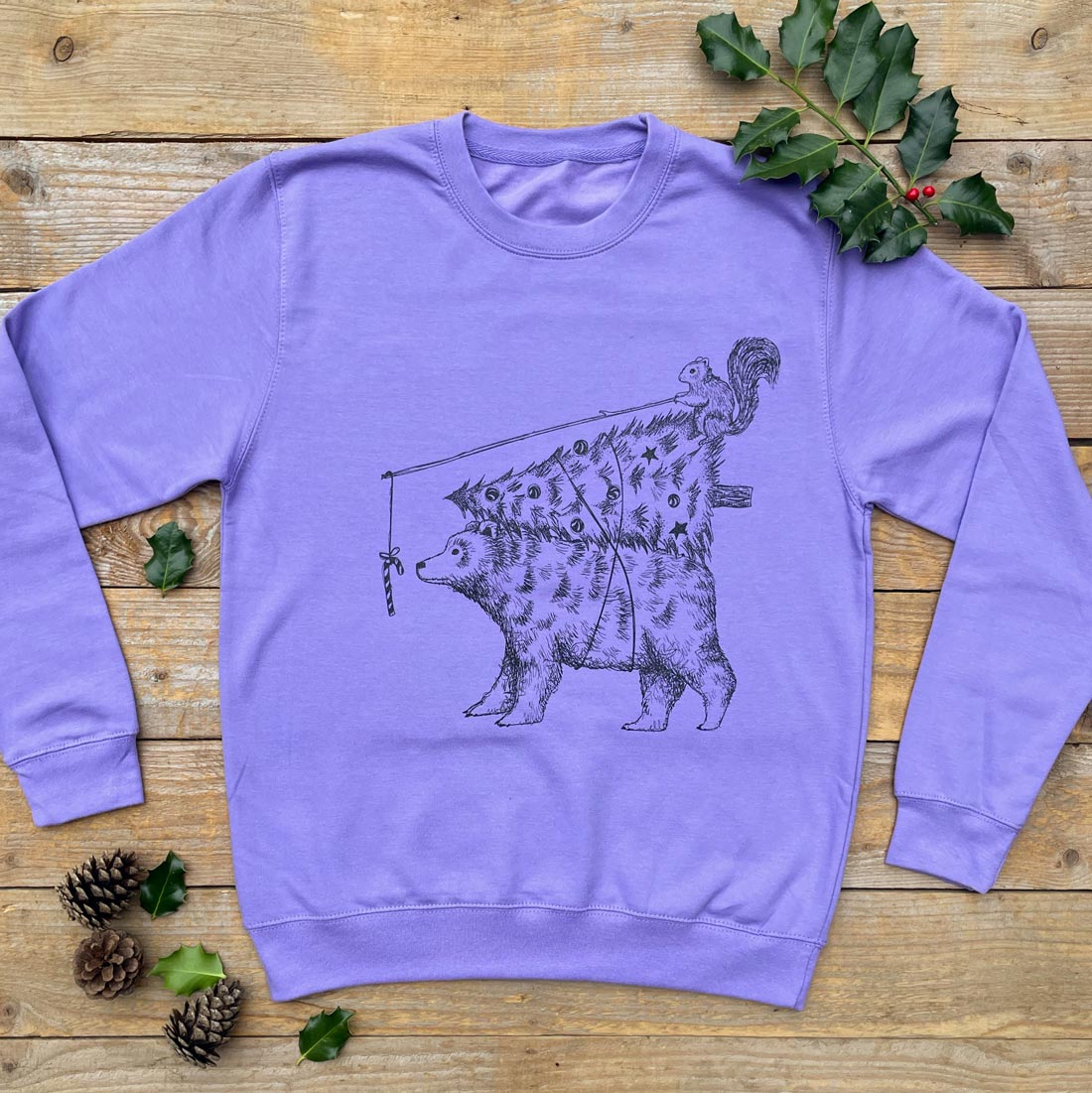 purple xmas jumper with bear and squirrel