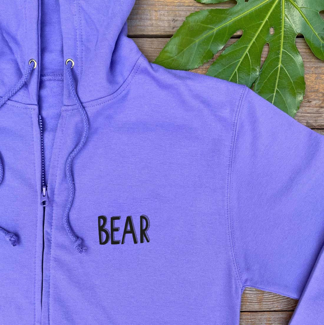 purple hoodie with bear text