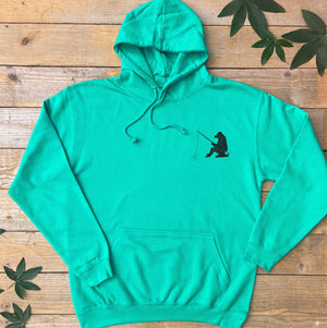 green hoodie with bear fishing