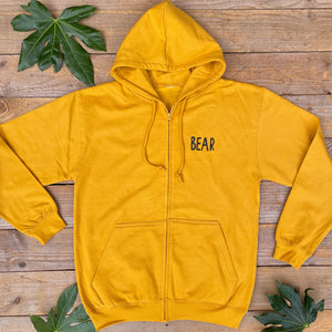 mustard hoodie bear text