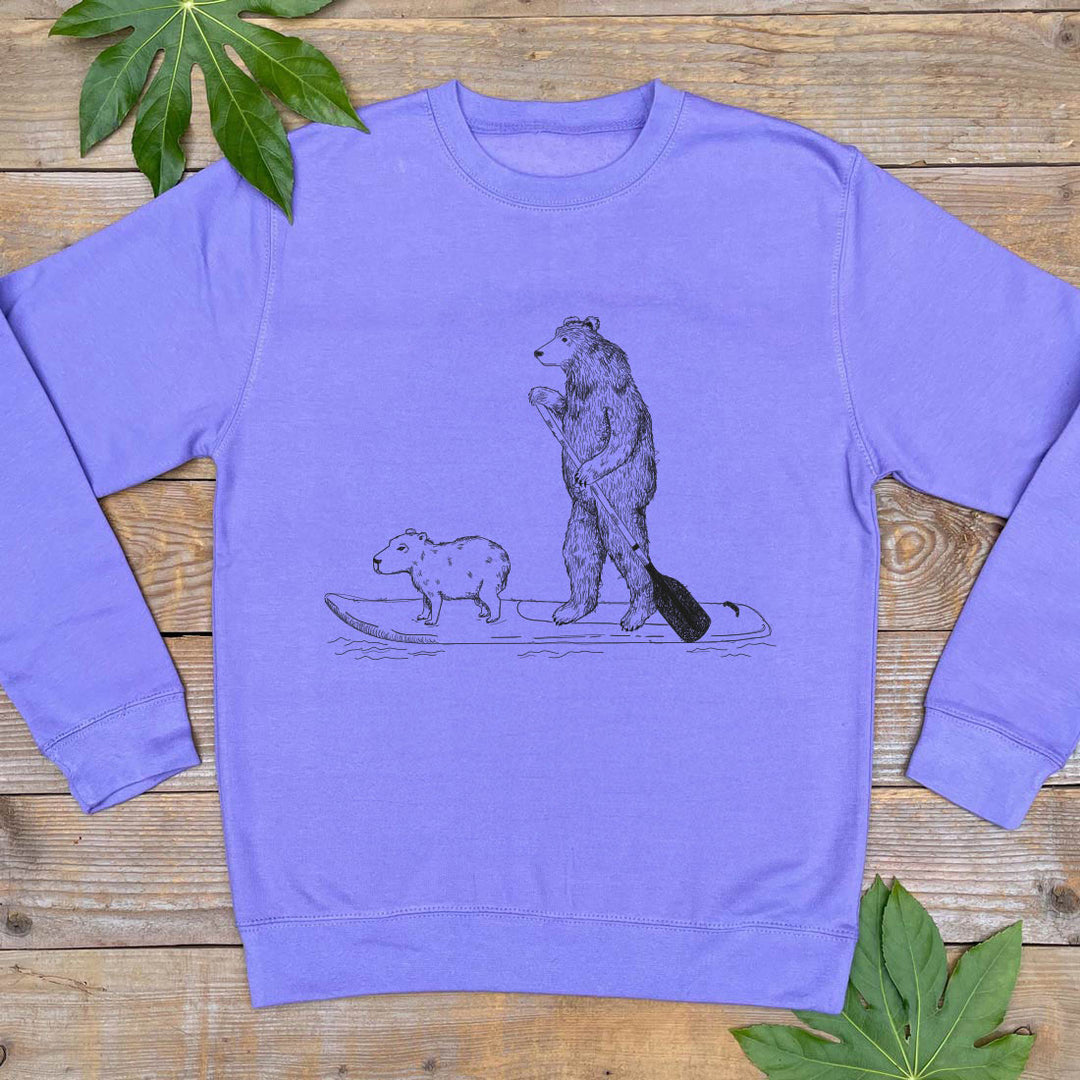 purple jumper with bear on a paddle board