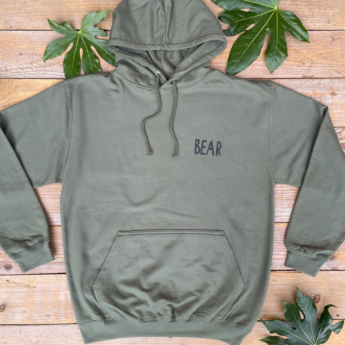 khaki hoodie with Bear text