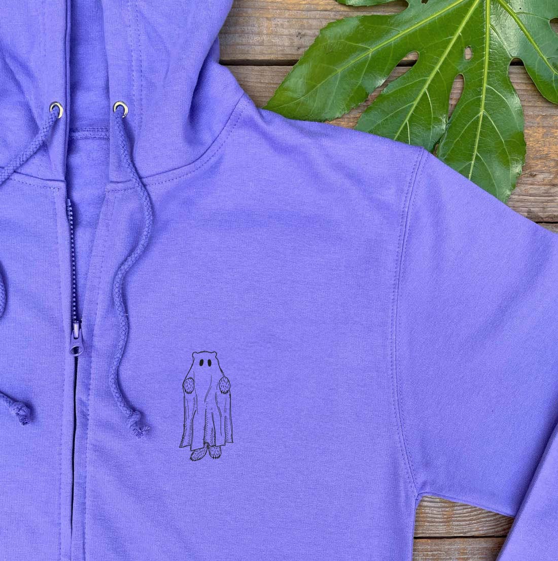 purple hoodie with ghost bear design