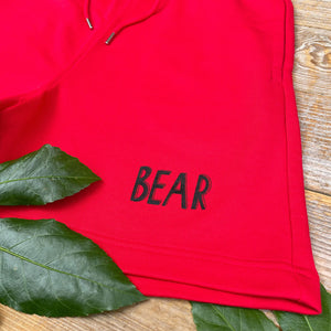 red shorts with bear text