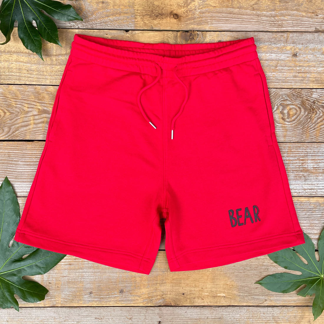 red shorts with bear text